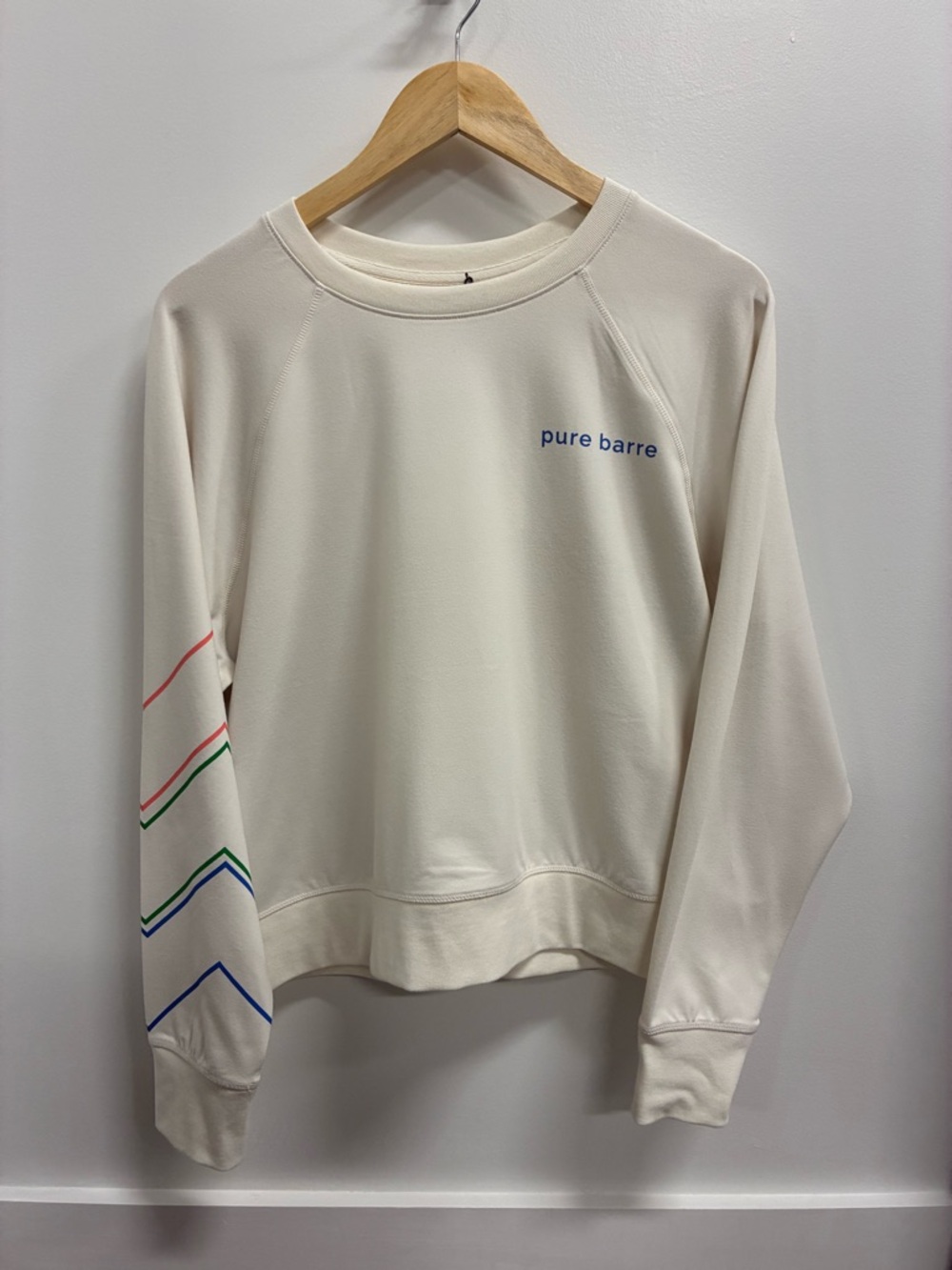 Pure Barre Cream Crewneck with Multicolor Sleeve Stripes